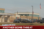 TV news screenshot that says "Another Bomb Threat"